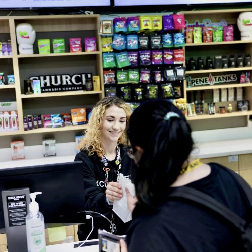 Exclusive Employee happy to serve the Customer
